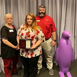 Jamie Haney’s family accepted the OCPRA award on her behalf. Pictured (L-R): Jeana Fowler, Amy Pickard, John Pickard. (photo provided)