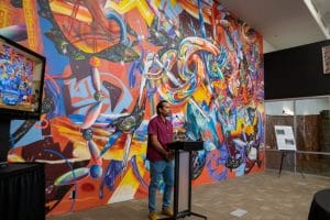 Yatitka Starr Fields with CEC Mural
