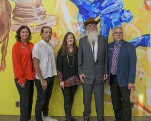 Cutline: NOC Tonkawa formally dedicated the Pickens Learning Commons Wednesday, Oct. 12. Pictured (L-R): Vice President for Community Relations & Development Sheri Snyder, Mural Artist Yatika Starr Fields, former NOC President Dr. Cheryl Evans, art collector Hugh Pickens, NOC President Dr. Clark Harris. (photo by John Pickard/Northern Oklahoma College). 