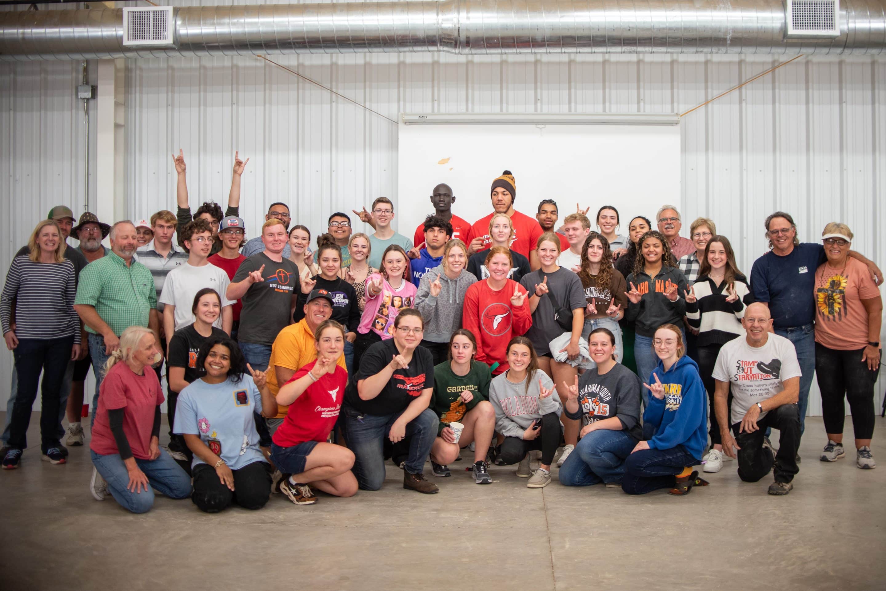Over 100 volunteers including NOC students participated in a Stamp Out Starvation project at the First United Methodist Church on Sunday.  (photo provided)