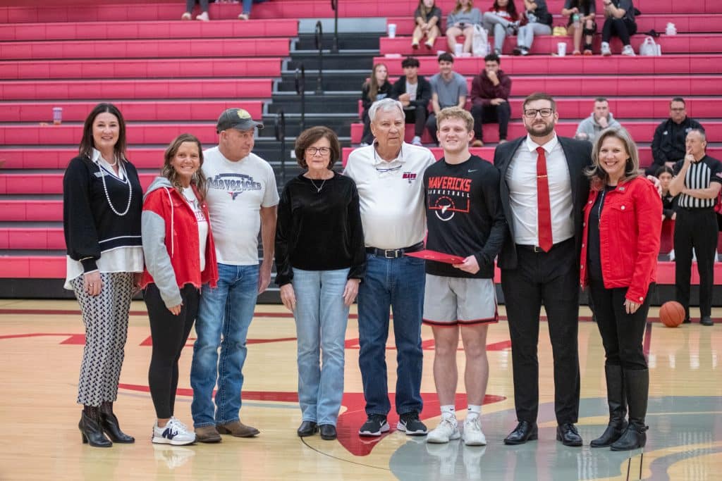 Tyler Day received the Jared Weiberg Endowed Memorial Scholarship at NOC’s game against NOC Enid Monday night.  Pictured (L-R):  NOC Vice President for Community Relations & Development Sheri Snyder, Becky Day, Robert Day, Vina Weiberg, Mick Weiberg, Tyler Day, coach Brandon Gossett, NOC Interim President Diana Watkins. (photo by Shiloh Martin/Northern Oklahoma College)