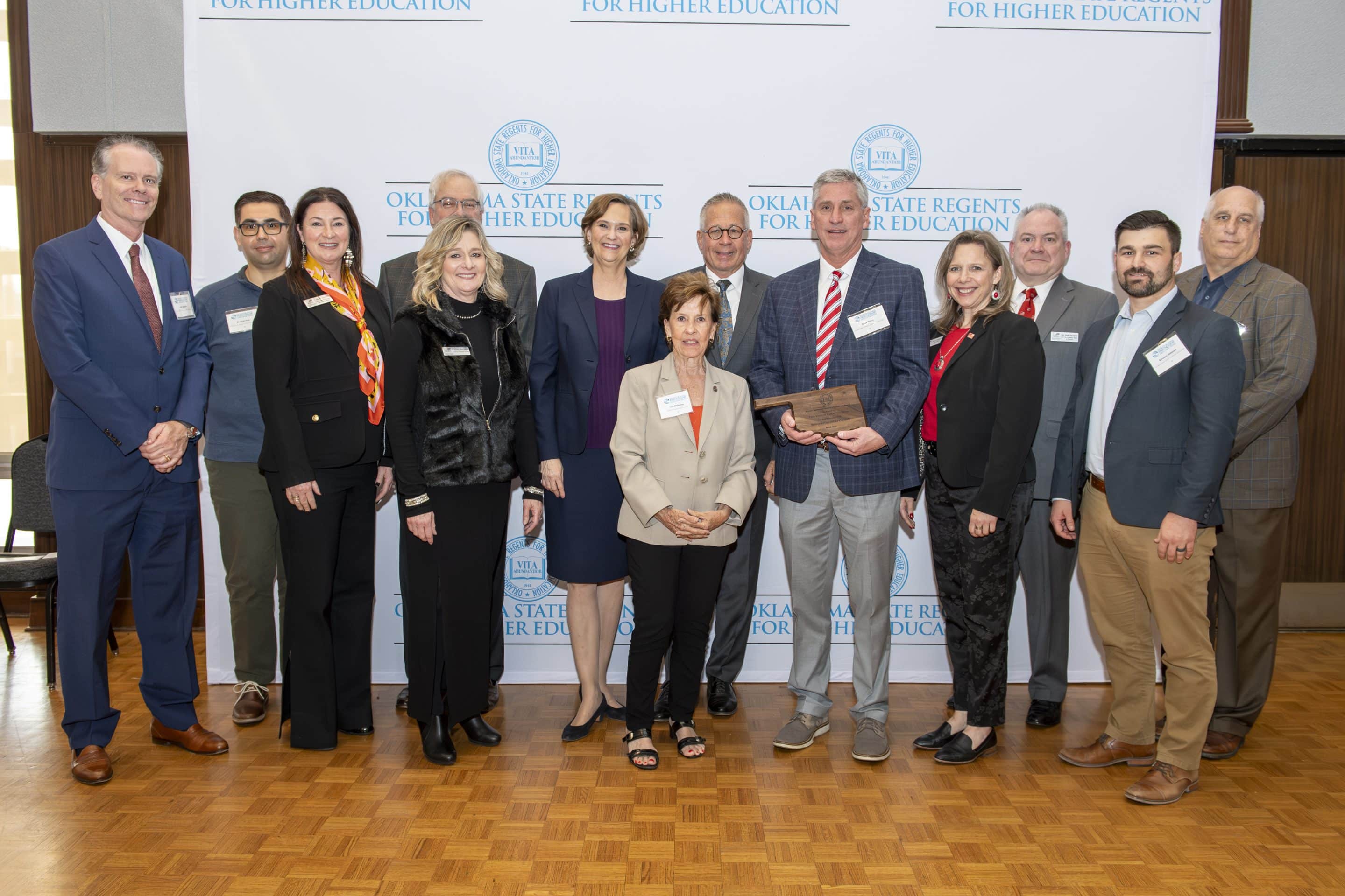 Northern Oklahoma College and First National Bank of Oklahoma were recognized for their business partnership in 2023.  Front Row (L-R):  Sheri Snyder, NOC Vice President for Community Relations & Development; Anita Simpson, NOC Vice President for Financial Affairs; Ann Holloway, State Regent; Brad Purdy, FNB President and Regional Manager; Diana Watkins, NOC Interim President; Kramer Simpson, FNB Vice President.   Back Row (L-R): Mel Martin, FNB President and CEO; Ricardo Soto, FNB Vice President; Patrick Rooney, FNB Executive Chairman; Chancellor Allison D. Garrett, Oklahoma State Regents for Higher Education; State Regent Jack Sherry; Dr. Rick Edgington, NOC Vice President for Enrollment Management; Alan Foster, NOC Director of Athletics.  (photo provided)