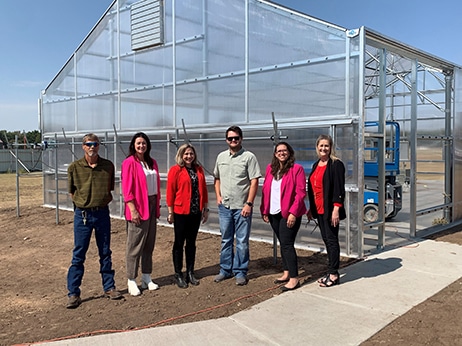 NOC officials met with Dr. Kyle Parmley at the new greenhouse, a part of NOC’s Precision Agriculture Program.  Pictured (L-R):  Stacey Burns, Director of Physical Plant; Sheri Snyder, Vice President for Development & Community Relations; Diana Morris Watkins, President of NOC; Dr. Kyle Parmley, NOC Precision Agriculture Specialist; Anna Roland, NASNTI Title III Grant Program Director; Anita Simpson, Vice President for Financial Affairs.  (photo by Dina Kleinmann/NOC)
