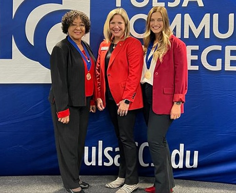 Dr. McCoy, President Watkins, Kayla Wooderson