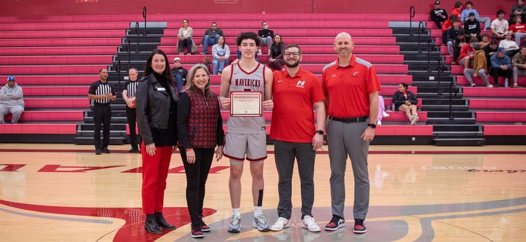 Levi O’Brien was named the winner of the Donald Hays Scholarship for the 2024-25 season.  Pictured (L-R):  Sheri Snyder, Vice President for Development & Community Relations; NOC President Diana Morris Watkins, Levi O’Brien, Mavs Coach Brandon Gossett, Ryan Paul, NOC Dean of Students.  (photo by Shiloh Martin/NOC)