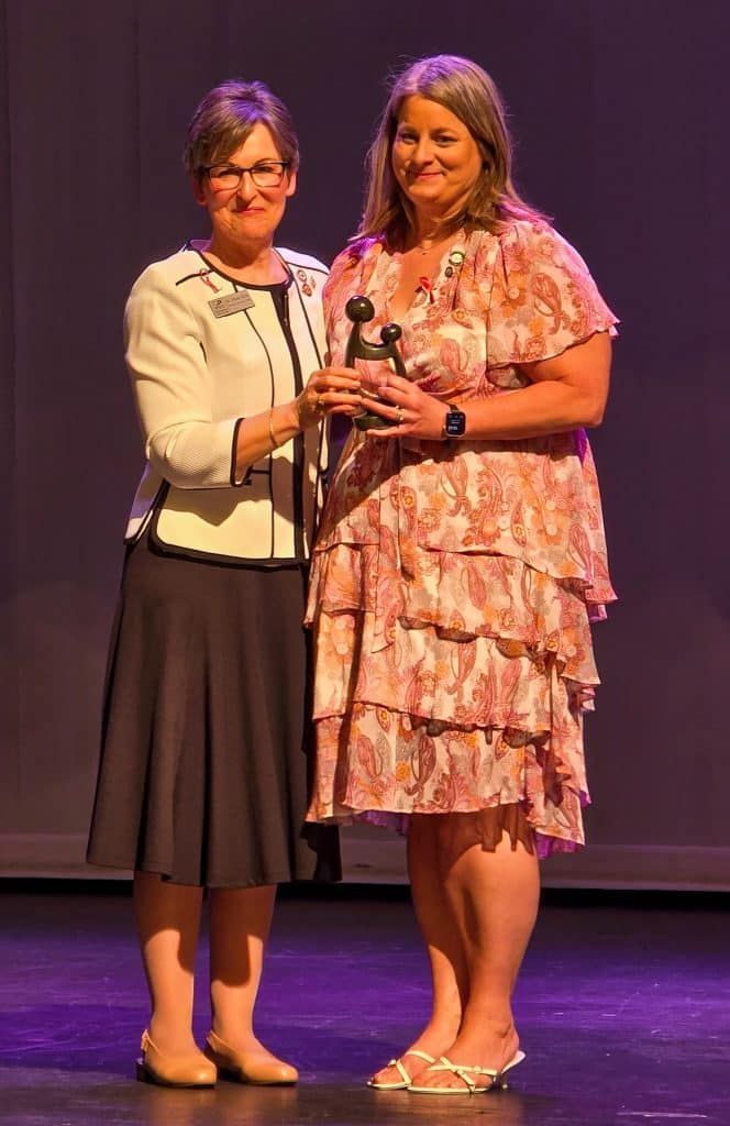 Rachel Kroemer (right) receives the DAISY Award® from NOC Nursing Division Chair Dr. Nikole Hicks (photo by Dina Kleinmann/NOC)