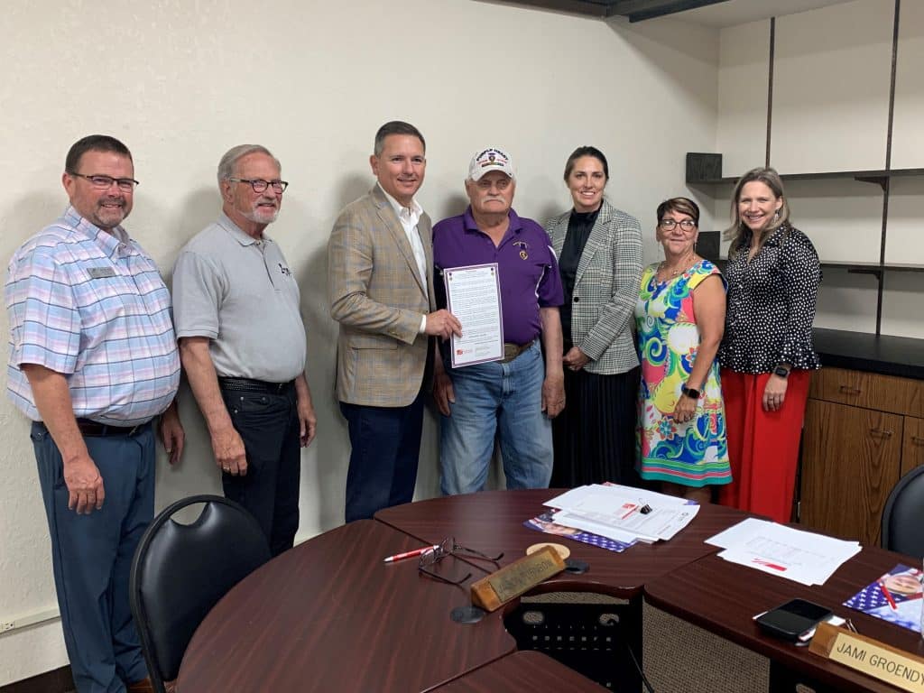 The NOC Board of Regents approved a proclamation making NOC a Purple Heart College.  Pictured (L-R):  Vice President for Enid Jeremy Hise, Regent Mike Loftis, Regent Chair Jason Turnbow, Purple Heart Recipient Jack Toney, Regent Jami Groendyke, Regent Sandy Mulligan, President Diana Morris Watkins.  