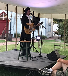 John Lennon was one of the historical figures represented at the Chautauqua Teachers' Institute in Enid
