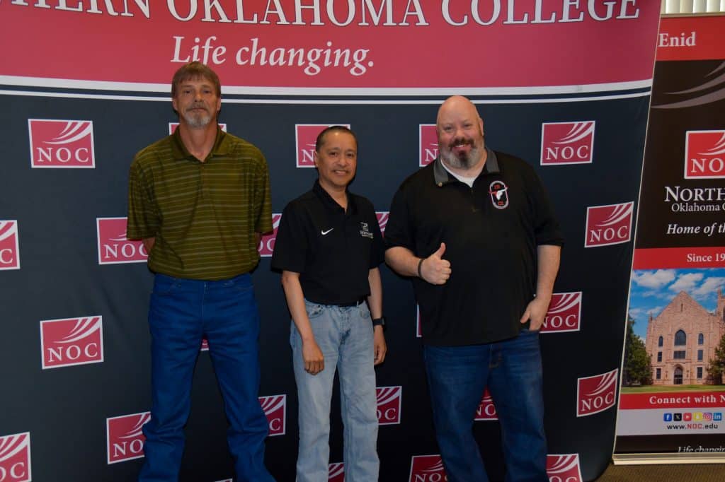 Physical Plant Manager Stacy Burns (left), NOC Enid IT Coordinator Adrian Ibarra (middle) and Criminal Justice Instructor Troy Cochran (right), were recognized as Oklahoma Association of Community Colleges award winners for NOC.  (photo by Caroline/Hillock/NOC)