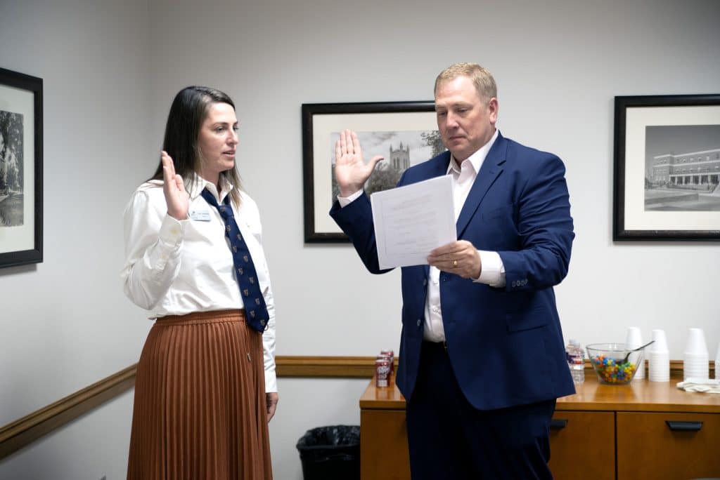 NOC Regent Jami Groendyke is sworn in for another five-year term by fellow regent Andrew Eubank at last Wednesday’s regent meeting in Tonkawa.