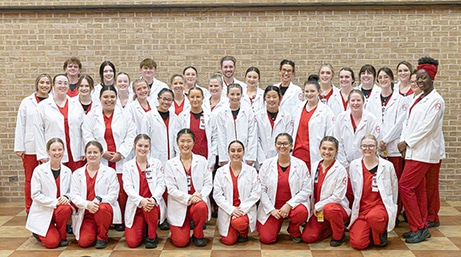 NOC student nurses received their white coats in a ceremony at NOC Enid on Tuesday. The white coat symbolizes the students’ transition from the classroom to clinical work in the nursing program. (photo by Mallory Kyler/NOC)